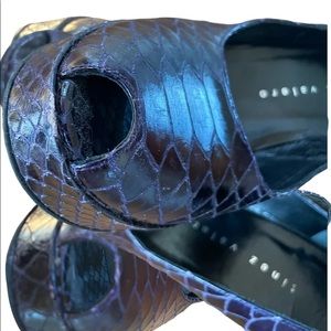 Amazing Martinez Valero pumps.  4” heels, purple platform.